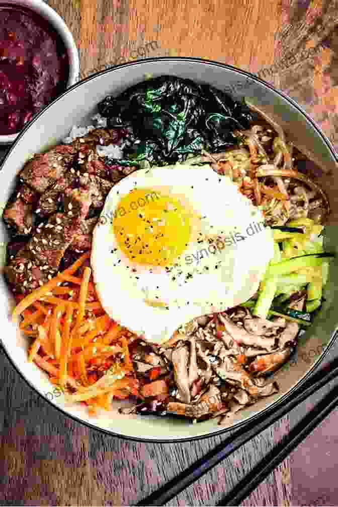 A Mouthwatering Image Of A Traditional Korean Meal, Featuring Bibimbap, Bulgogi, And Other Delicious Dishes. The Ultimate Guide To Visiting South Korea: Your Travel Guide To South Korea Travel Tips And More