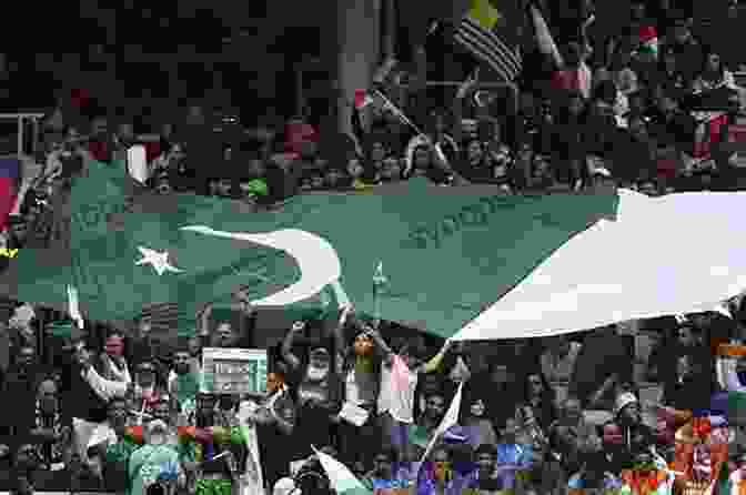 A Pakistani Cricket Fan Wearing A Green Jersey And Waving A Flag Batting For Pakistan DAVID HUNT