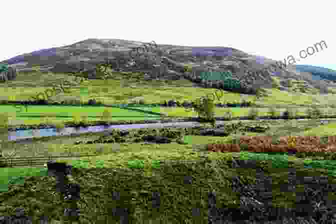 A Serene Landscape Of The Scottish Lowlands, With Gentle Hills, A Winding River, And A Medieval Castle In The Distance. Scotland The Guide For Tourists Travellers