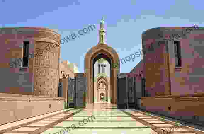 A Stunning View Of The Muscat Skyline, With The Sultan Qaboos Grand Mosque In The Foreground. Oman Travel Guide And Travel Information