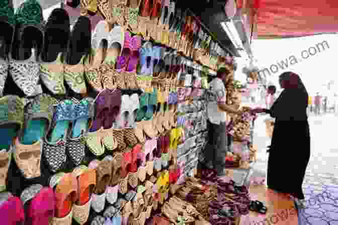 Bustling Scene In An Abu Dhabi Souk, Showcasing Vibrant Textiles, Spices, And Traditional Crafts. Frommer S Dubai And Abu Dhabi Day By Day