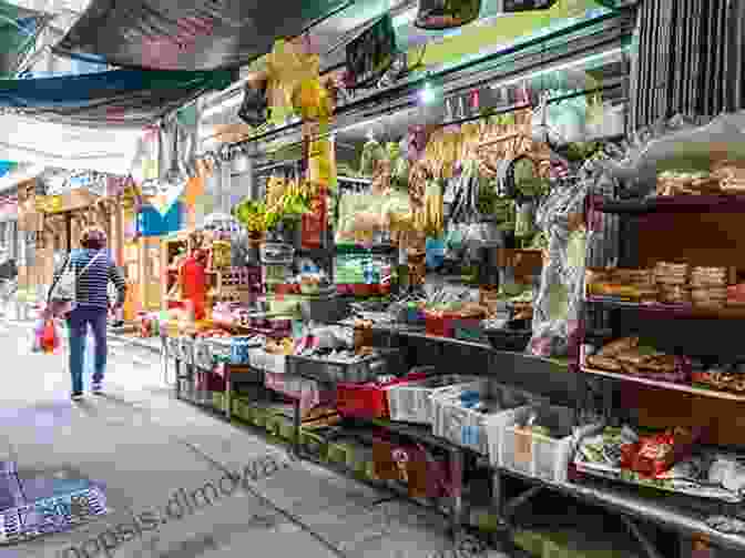 Bustling Street Food Market On Peng Chau Island, Offering An Array Of Delectable Local Dishes, With Vendors Preparing Food In Traditional Woks And Steamers Hong Kong Islands: Peng Chau Island