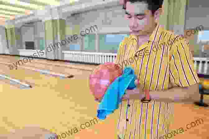 Image Of A Person Cleaning A Bowling Ball Bowling: The Quick And Easy Guide To Win Bowling For Dummies Bowling For Beginners