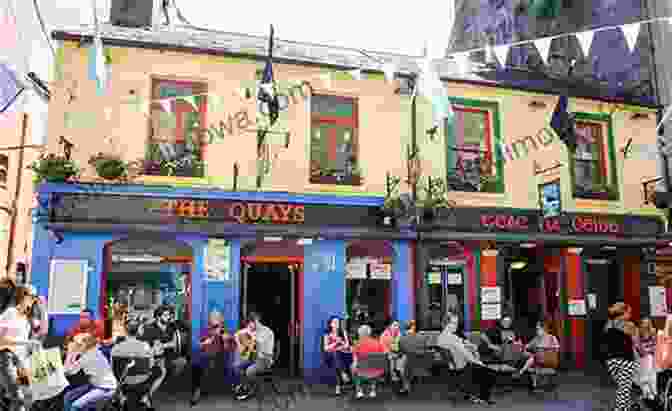 Lively Atmosphere Of Galway City, With Colorful Pubs, Traditional Music, And Street Performers Ireland Travel Guide: The Top 10 Highlights In Ireland (Globetrotter Guide Books)