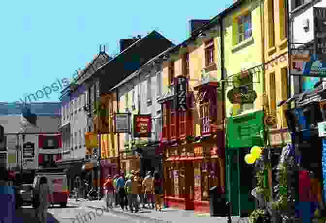 Picturesque Streetscape Of Killarney, With Traditional Irish Pubs, Colorful Shops, And Horse Drawn Carriages Ireland Travel Guide: The Top 10 Highlights In Ireland (Globetrotter Guide Books)