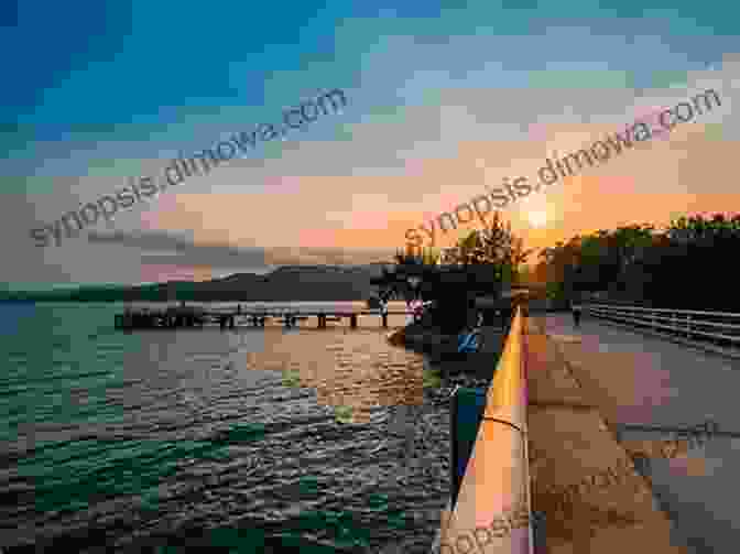 Serene Sunset Over Peng Chau Island, With The Sky Awash In Hues Of Orange, Pink, And Purple, Casting A Warm Glow Over The Tranquil Waters Hong Kong Islands: Peng Chau Island