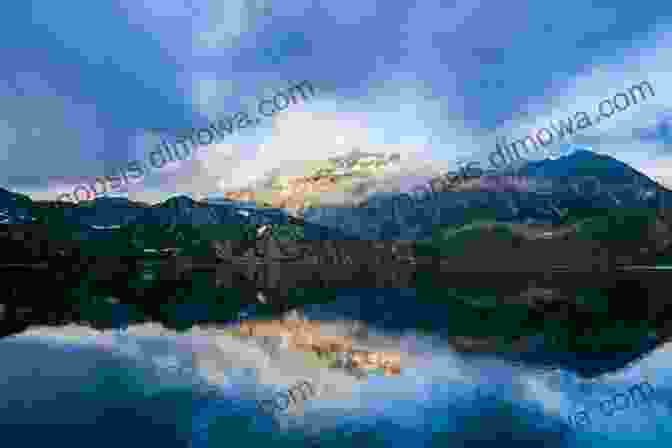 Tranquil Lake Surrounded By Snow Capped Alpine Peaks Across Europe In A Motor Boat